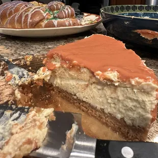 Slice of POG (passion fruit, orange, guava) cheesecake