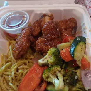 a take out container of food