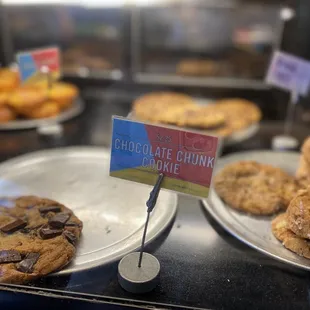 a display of cookies and pastries