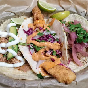 Left to right: chicken tinga, fried fish, &amp; carnitas tacos.