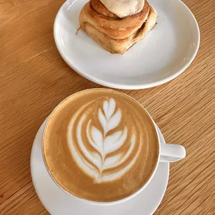 Cappuccino and cinnamon roll with espresso glaze.