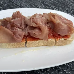 Tomato prosciutto toast ($11)