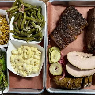 Pork belly, moist brisket, turkey, sausage, Tex-Elote, green beans, Shishito peppers, Mac and cheese.