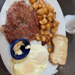 Corned beef hash , eggs, potatoes and gluten free toast