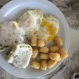 Biscuits and gravy with tots and eggs