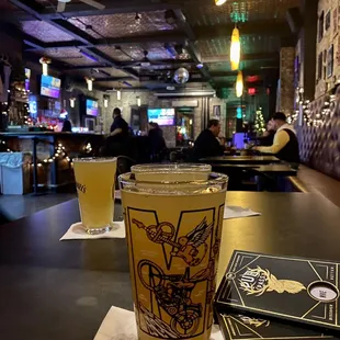 a pint of beer on a table