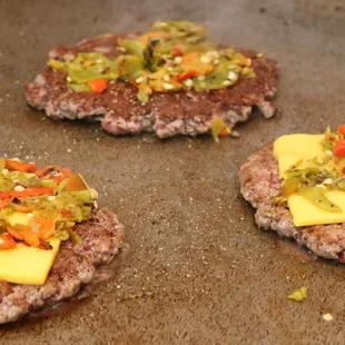 Green Chile Cheeseburgers Grilling at Revel Burger