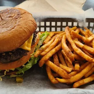 Combo Special of stacked tall ground beef burger with cheese &amp; green chile, plus beer battered fries &amp; a drink.