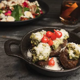 a plate of meat and vegetables