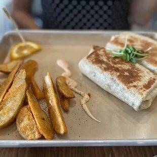 Plant based breakfast burrito and fries