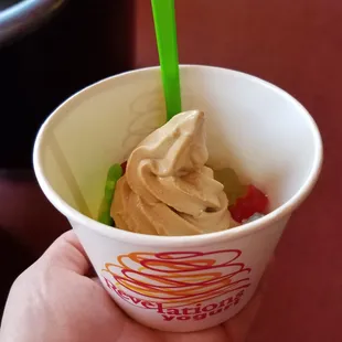 Salted caramel froyo with gummy bears, funny frog and mochi balls.