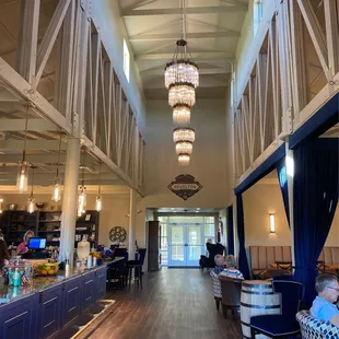 a restaurant with high ceilings