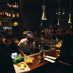 people sitting at a bar