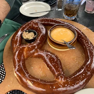 Giant pretzel - ask for mustard, cheese sauce tasted like nacho cheese
