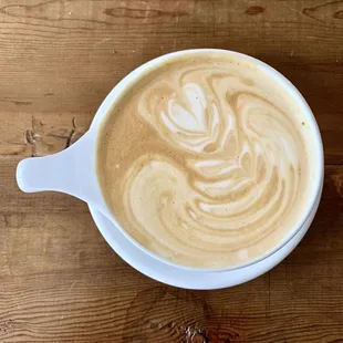 Hot latte with pumpkin spice syrup