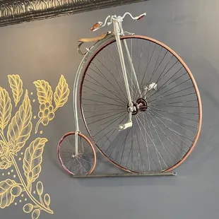 A unicycle on the wall