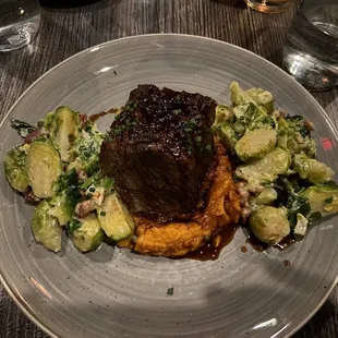 Short Ribs on a bed of sweet potatoes, with brussel sprouts
