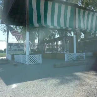 a green and white awning