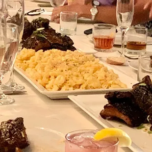 a table full of food and drinks