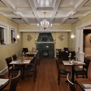 a dining room with a fireplace
