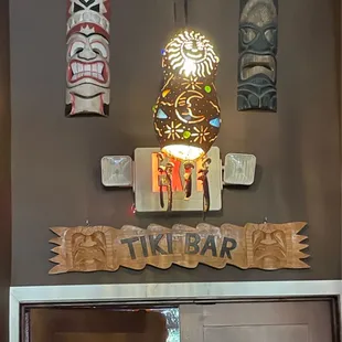 Walk on past the front restaurant to enter the TIKI BAR