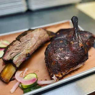 ribs and vegetables on a plate