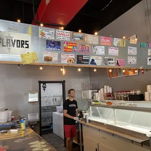 a man standing in front of the counter