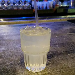 a drink in a glass with a straw