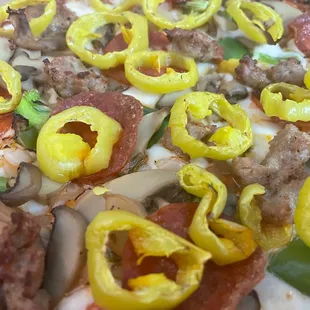 pepperoni, sausage, and peppers