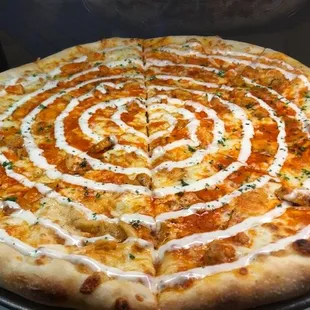 a pizza with a spiral design
