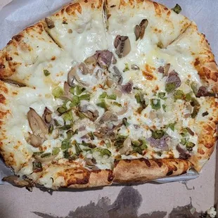 Undercooked and only half of pizza with toppings.