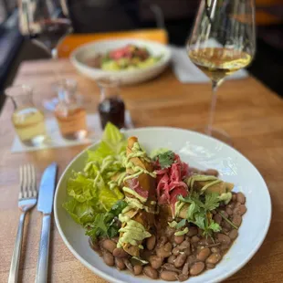 Vegan and gluten free! Mole Taquitos w/ Impossible carne molida, fire-roasted poblano peppers, mole, beans, green goddess &amp; pickled onions