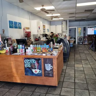 Counter, shelf, and street sign.