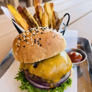 Brisket Smash Burger 8oz brisket sirloin blend, house made brioche bun, cut to order steakhouse fries with mango habanero ketchup