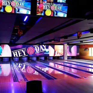 Beautiful LED video wall spans the width of the bowling lanes, perfect for watching the big game!