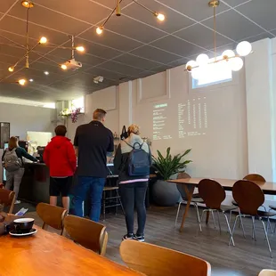 a group of people in a coffee shop