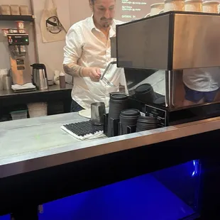 This person is quick ! Preparing coffees