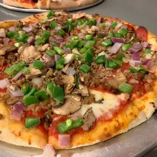 10" supreme with extra sausage, mushroom and add jalapeño