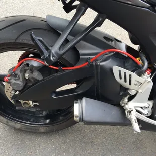 Back brake line, oh and my fresh painted pegs, I did those.