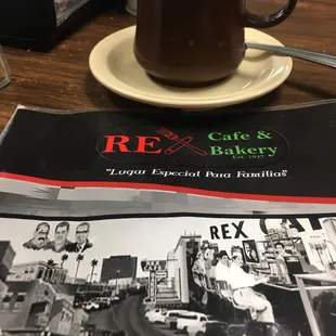 a cup of coffee and menu