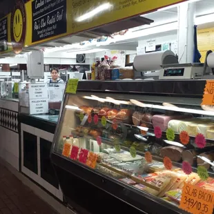a variety of food items in a display case