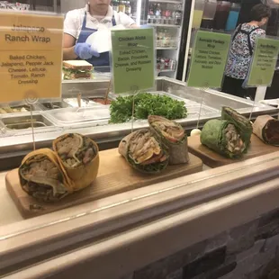 a variety of sandwiches on display