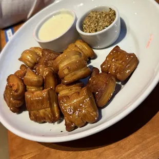 Fried pretzels with queso and mustard