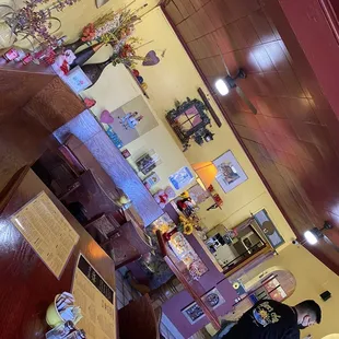 a woman standing in a restaurant