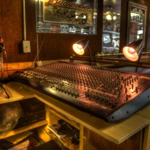 a recording desk with a sound board