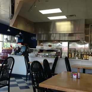a restaurant with a checkered floor