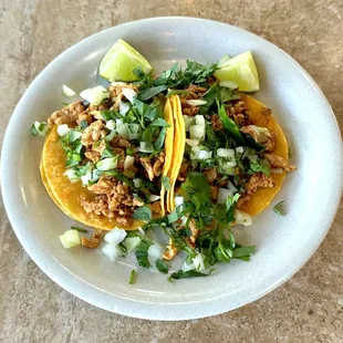 Two Grilled Chicken Street Tacos before a Trip to the Toppings Bar - Delish!