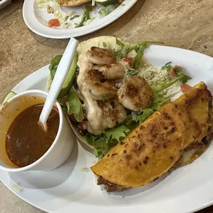Birria and grilled shrimp tacos.