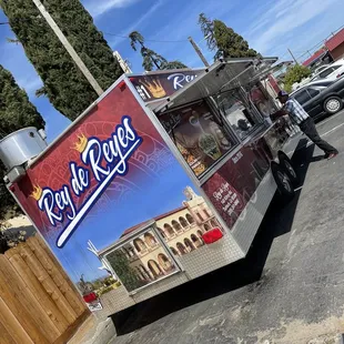 Food truck views, menu on the front of the truck.