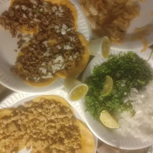 three plates of food on a table